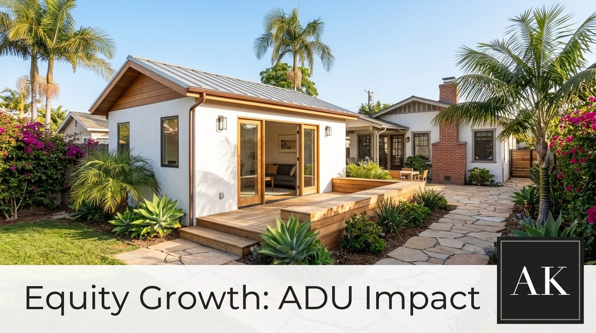 Modern ADU with wood deck and open doors, a stone path leads to the main house. Palm trees and bougainvillea.